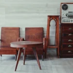 brown wooden chairs, table, and cabinet