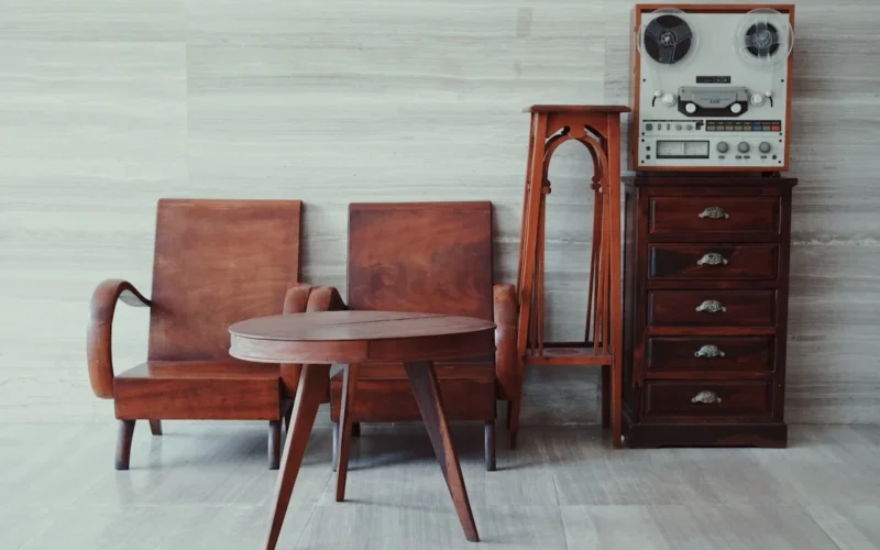 brown wooden chairs, table, and cabinet