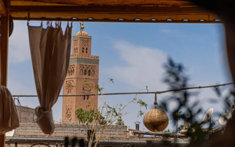 a tall tower with a clock on top of it