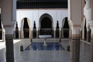 Courtyard with pool in La Mamounia Hotel (former historic palace)