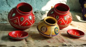 red and gold ceramic vase