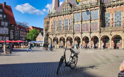 a bicycle is parked in front of a building