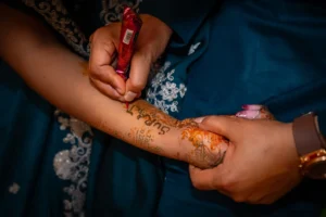 Romantic Mehendi Moment | Groom Writing His Name on Bride’s Hand in Nepali Wedding