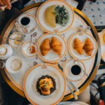 A luxurious breakfast spread with croissants and coffee.