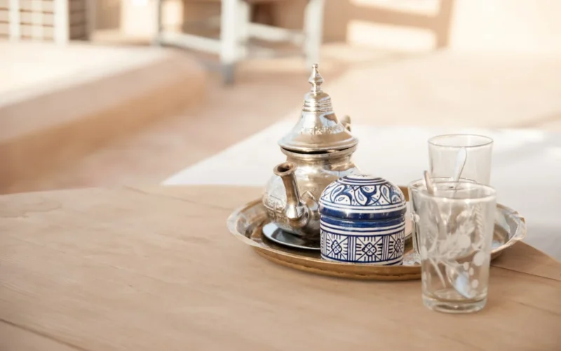 We travelled Marokko in 2010. Starting in Casablanca, we went on to Fès by train. We booked the Dar Bensouda from Casablanca and so we thought we knew where we had to go. Arriving at the Medina of Fès, it was impossible to find our way through the Medina. Many local people shouted and spat at us because we did not want to pay a local guy for taking our bags. After 1 hour walking through the extremely hot, narrow alleys, we decided to pay a local anyway and he brought us to our Riad. And that was a oasis in this crowdy Medina. Quiet, wonderful and the tea on the rooftop was gorgeous & relaxing