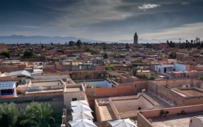 a view of a city with a clock tower in the distance