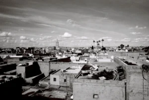 Rooftops and buildings under a cloudy sky