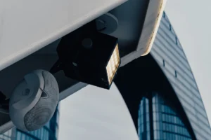 Lighting fixtures are attached to a building's exterior.