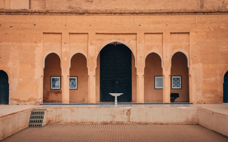 Courtyard with arched doorways and framed art