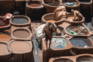 a group of clay pots filled with mud