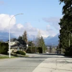 Suburban street with mountains in the background