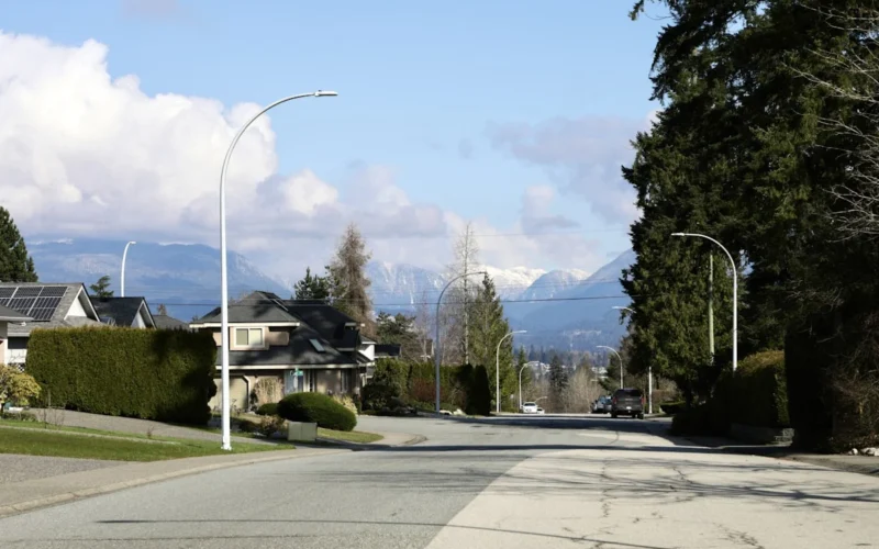 Suburban street with mountains in the background