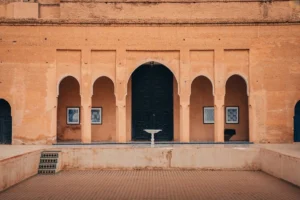Courtyard with arched doorways and framed art