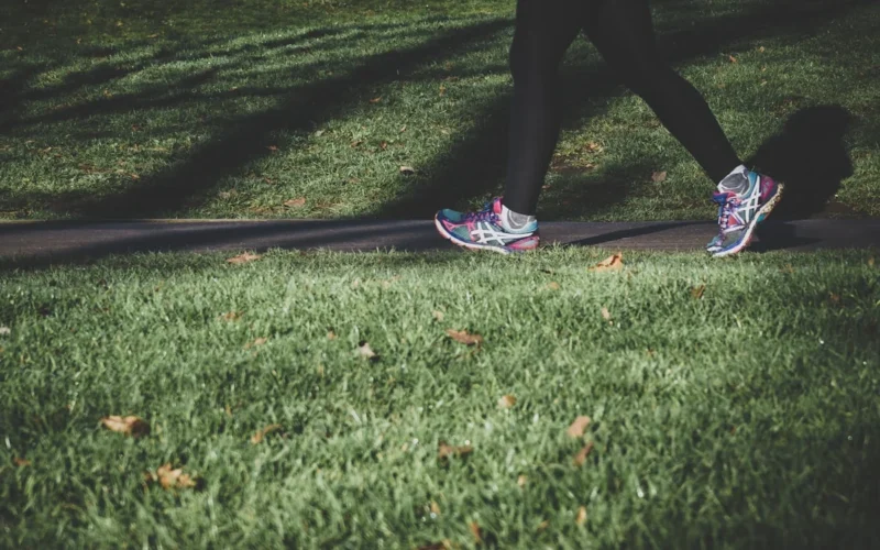 Lady running in a park in London