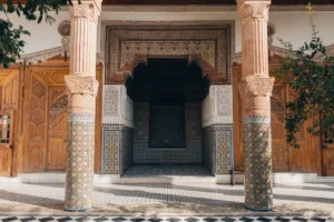 Ornate entryway with patterned tiles and columns