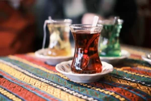 a cup of tea on a plate on a table