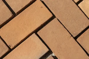 Herringbone pattern made with handcrafted red brick. 